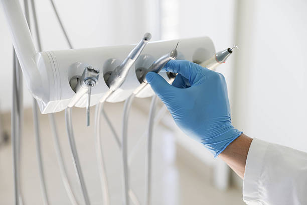 Professional Tooth Extraction technician working in Shannon, MS
